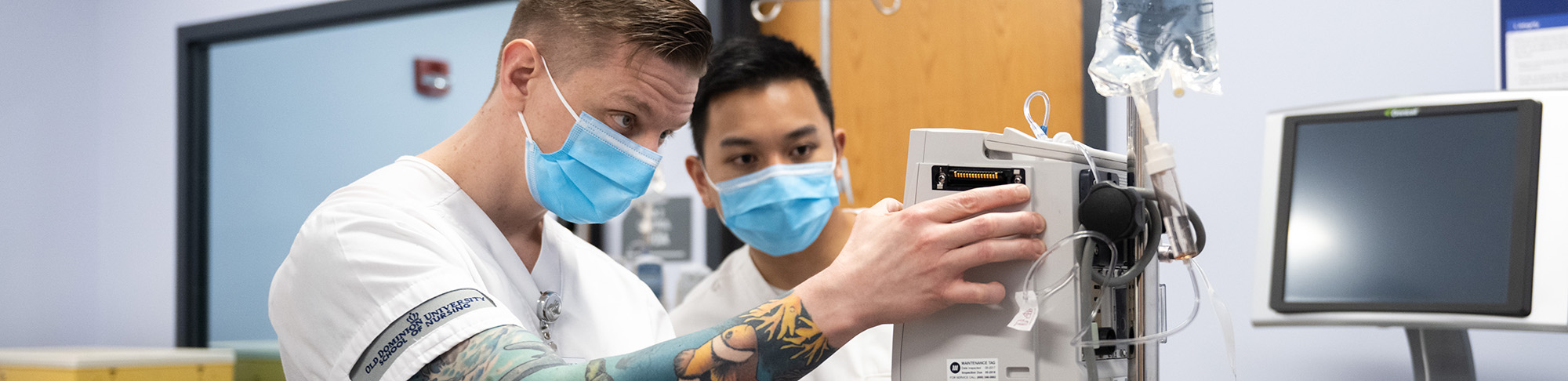 Nurses examine a medication equipment